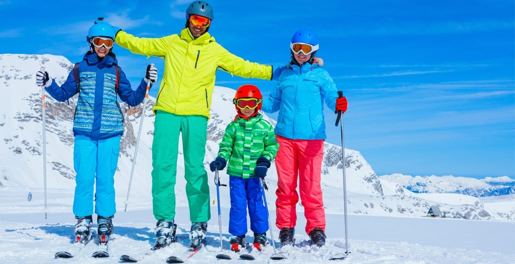 Gezin op skivakantie met perfecte ski-jas